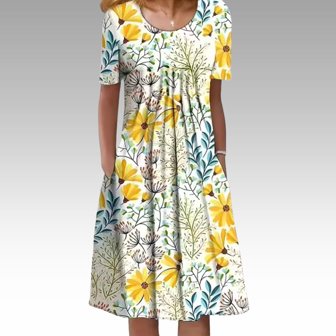 Ziva – Elegant Klänning med Blommönster och Magtäckning