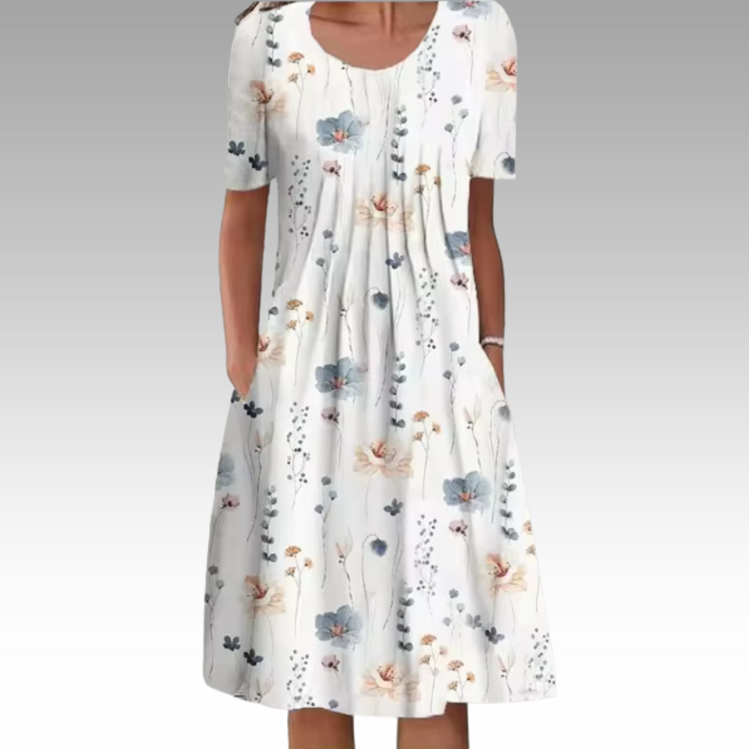 Ziva – Elegant Klänning med Blommönster och Magtäckning