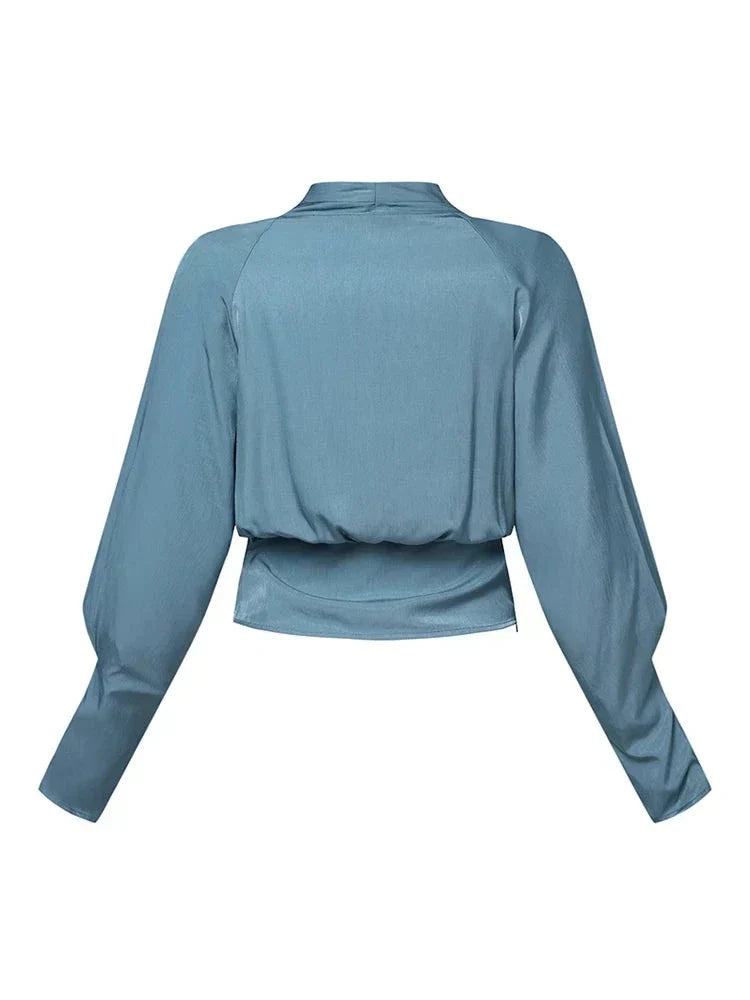 MIRELLA – ELEGANT DRAPERAD BLUS MED V-RINGNING