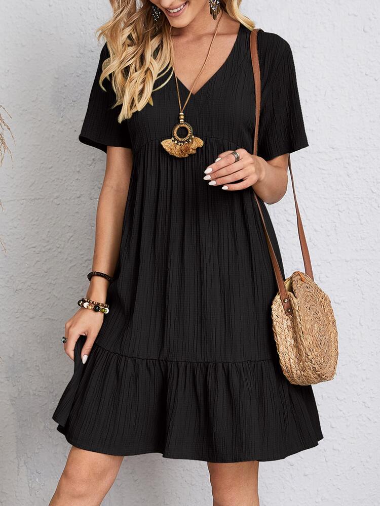 Danielle – Elegant Sommarklänning med Magen Täckande Design
