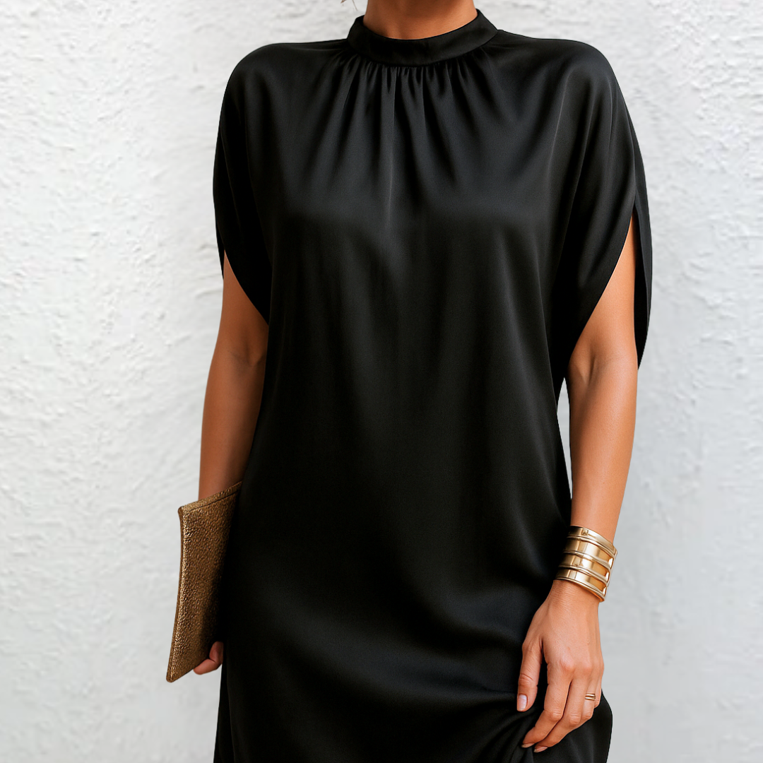 Elva  - Elegant och lekfull klänning