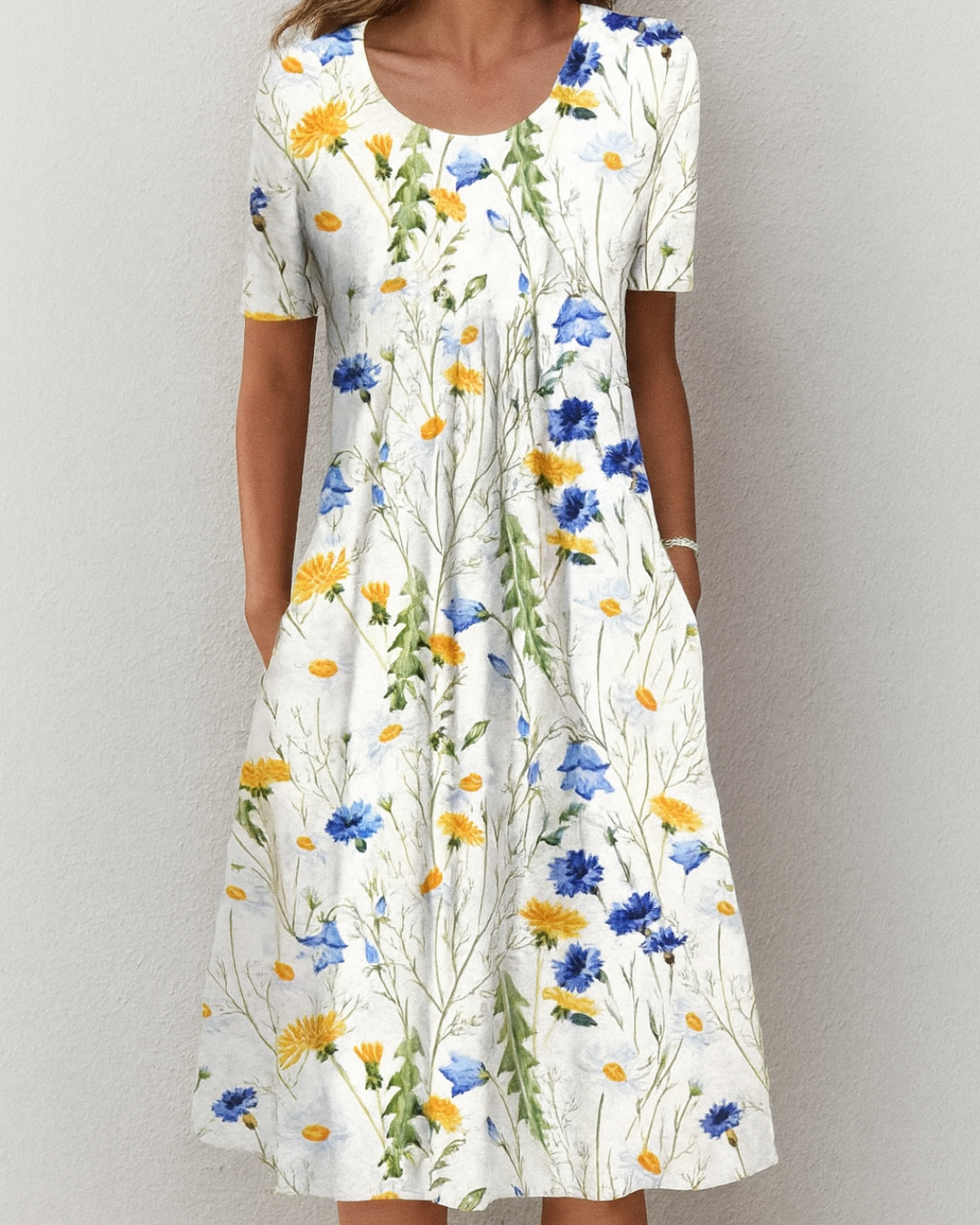 Elva - Stilfull och Vardaglig Blommig Klänning med Fickor