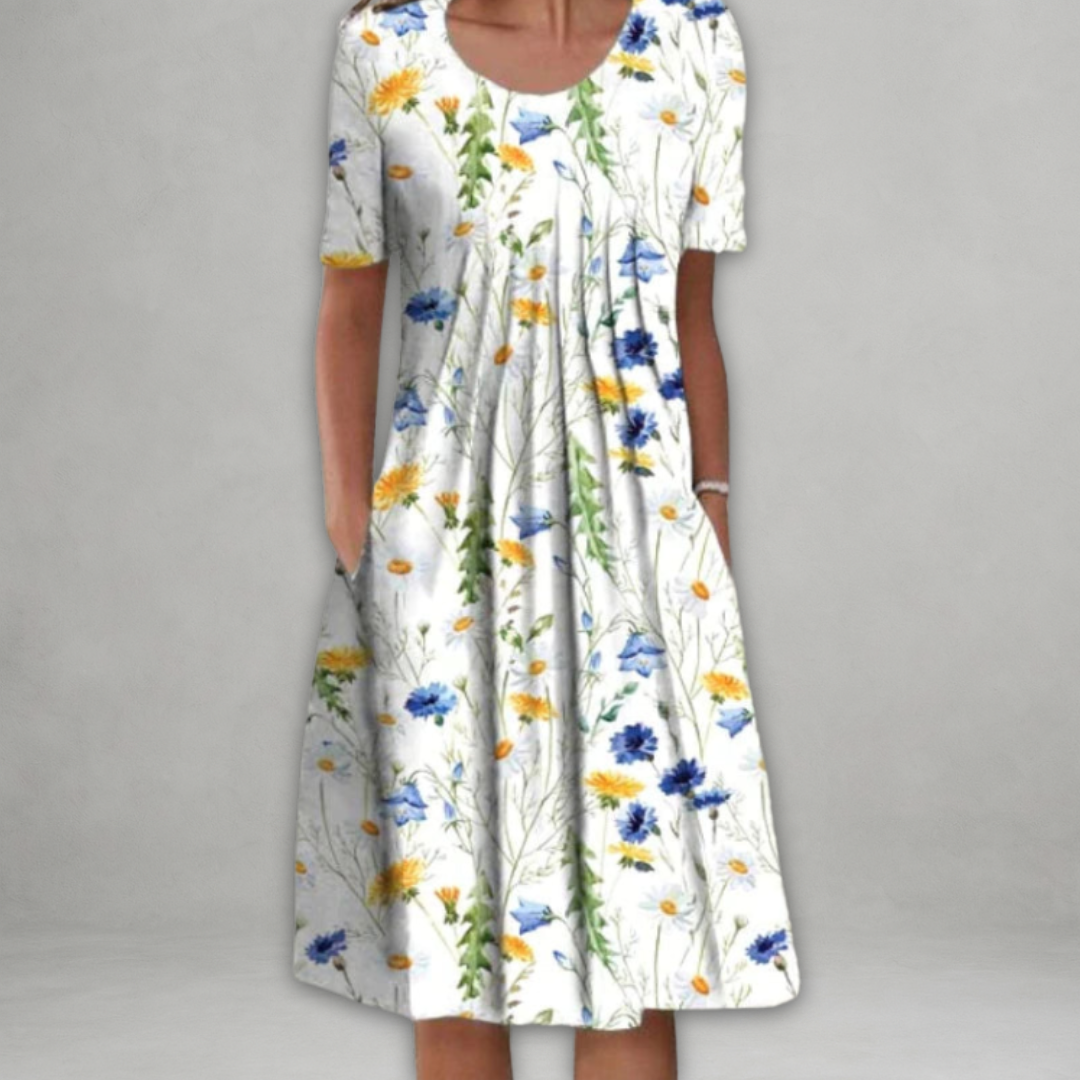 Eira - Elegant Klänning med Blommönster Som Täcker Magen