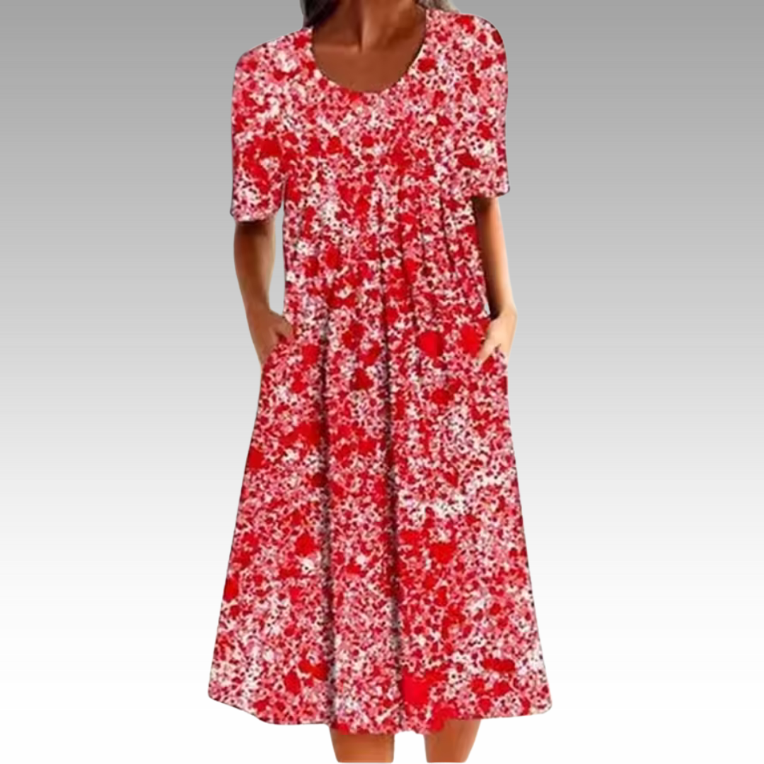 Ziva – Elegant Klänning med Blommönster och Magtäckning