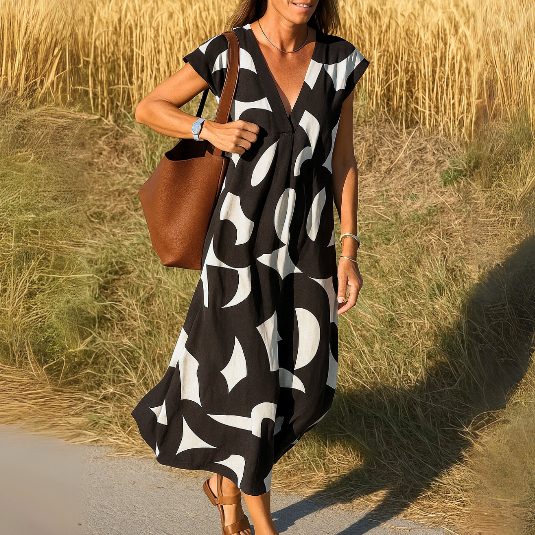 Azura - Ibiza-stil Bekväm och Flödande Klänning med V-ringning