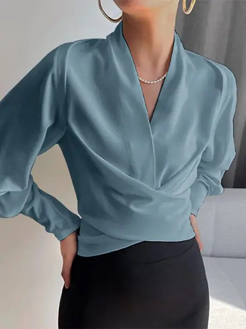 MIRELLA – ELEGANT DRAPERAD BLUS MED V-RINGNING